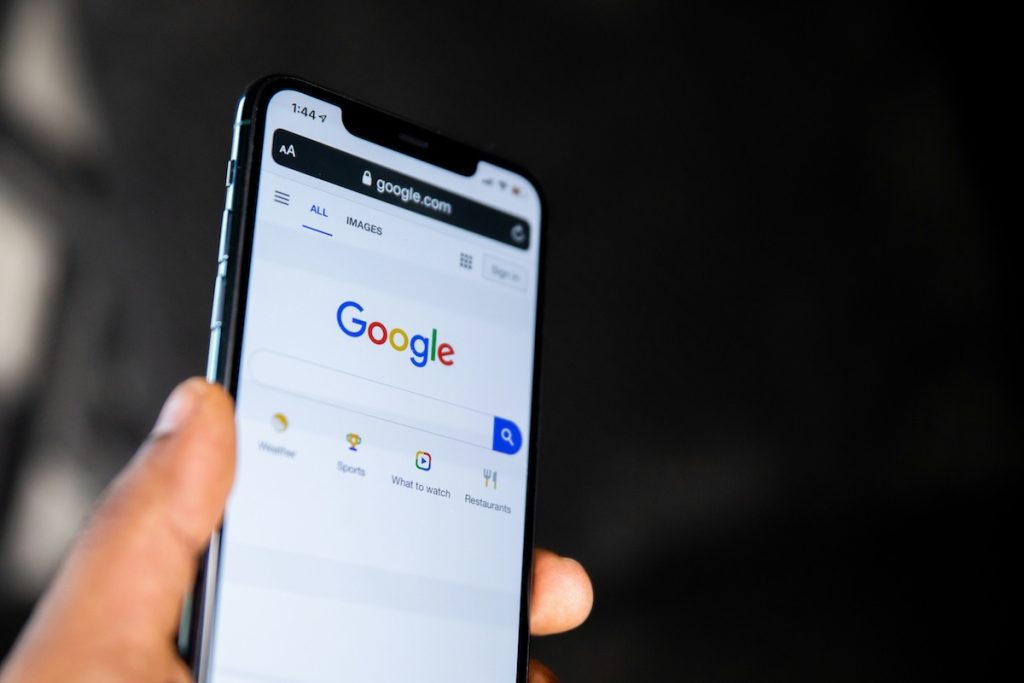 Phone showing a Google map with a location pin for a vacation rental